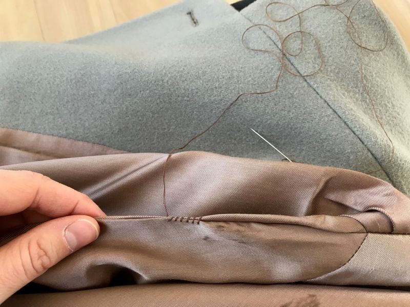 Using whip stitch to sew after removing shoulder pads