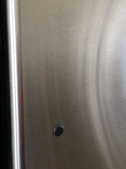 Picture of stainless steel grain on fridge