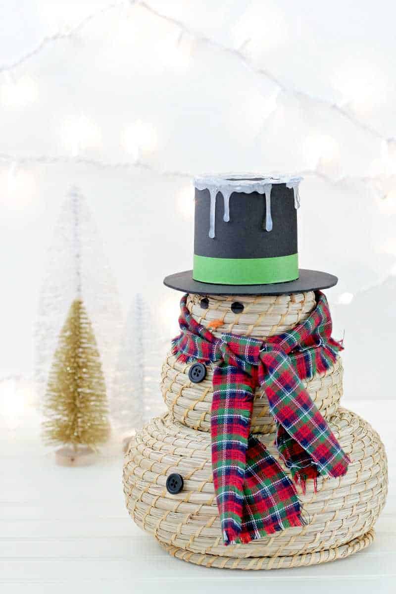 A cute snowman craft with hat and scarf