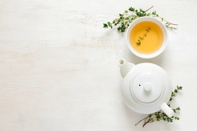 A zen teapot on a table cleaned with KonMari method