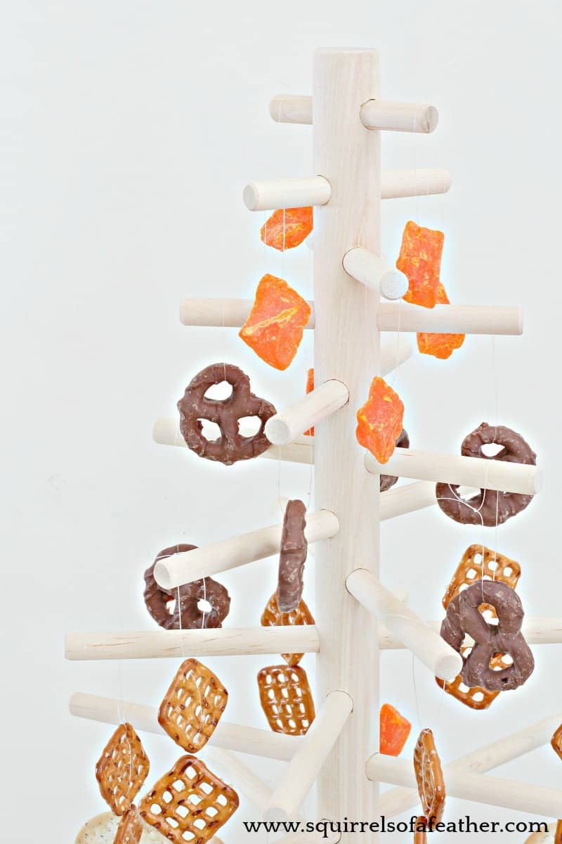 Close up of wooden dowel Christmas tree edible decor.