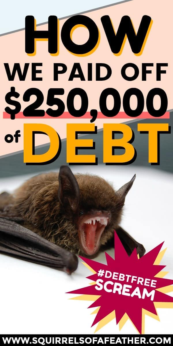 A bat with an open mouth and a funny "debt-free" sign next to him