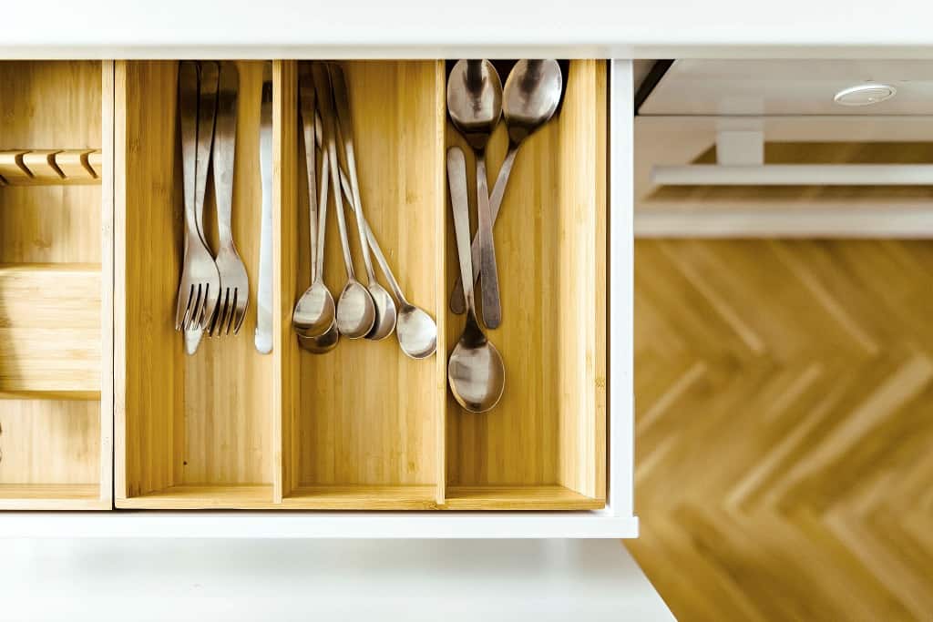 A minimalist drawer with beautifully organized utensils