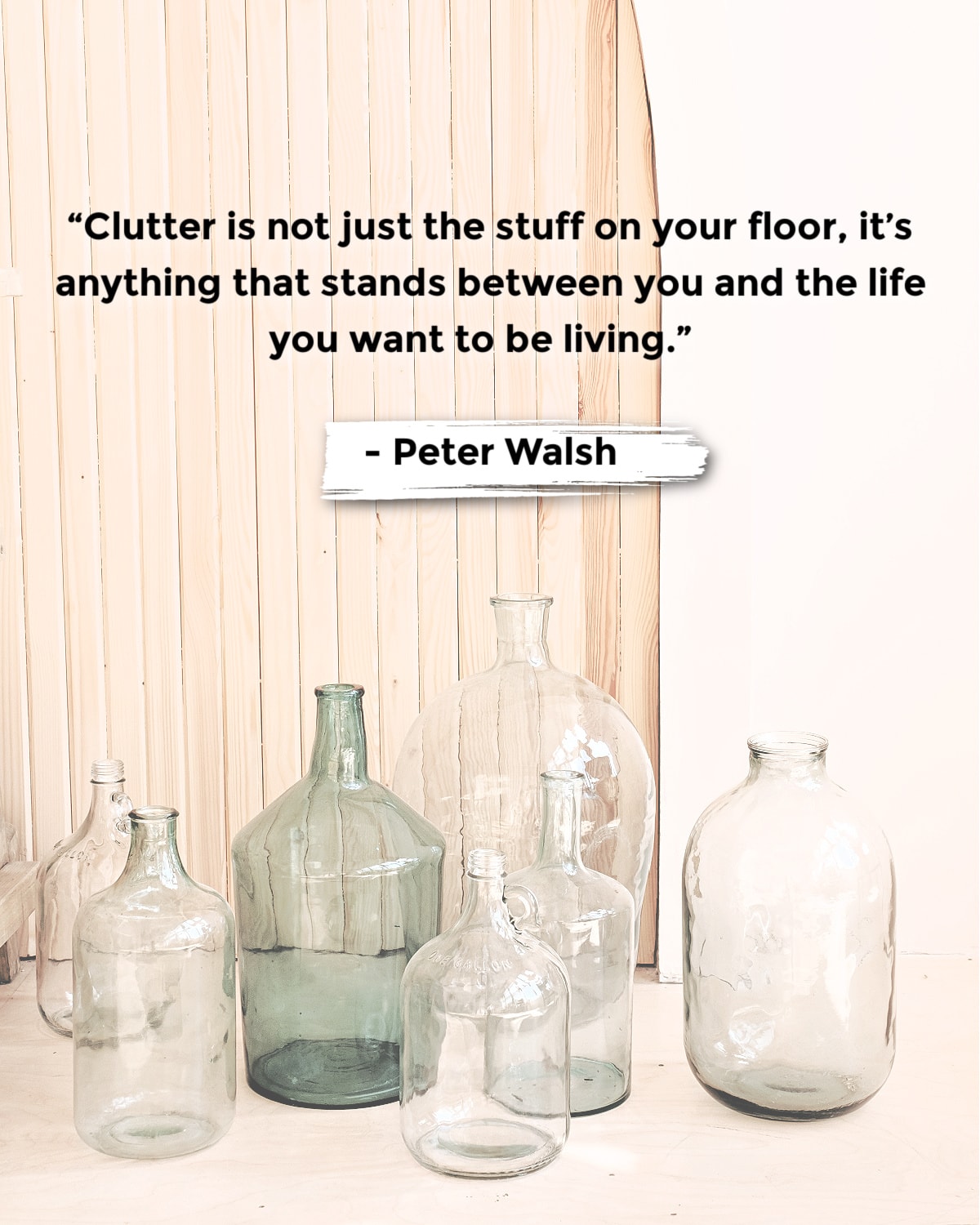 A quote about clutter from Peter Walsh next to bottles on the floor.