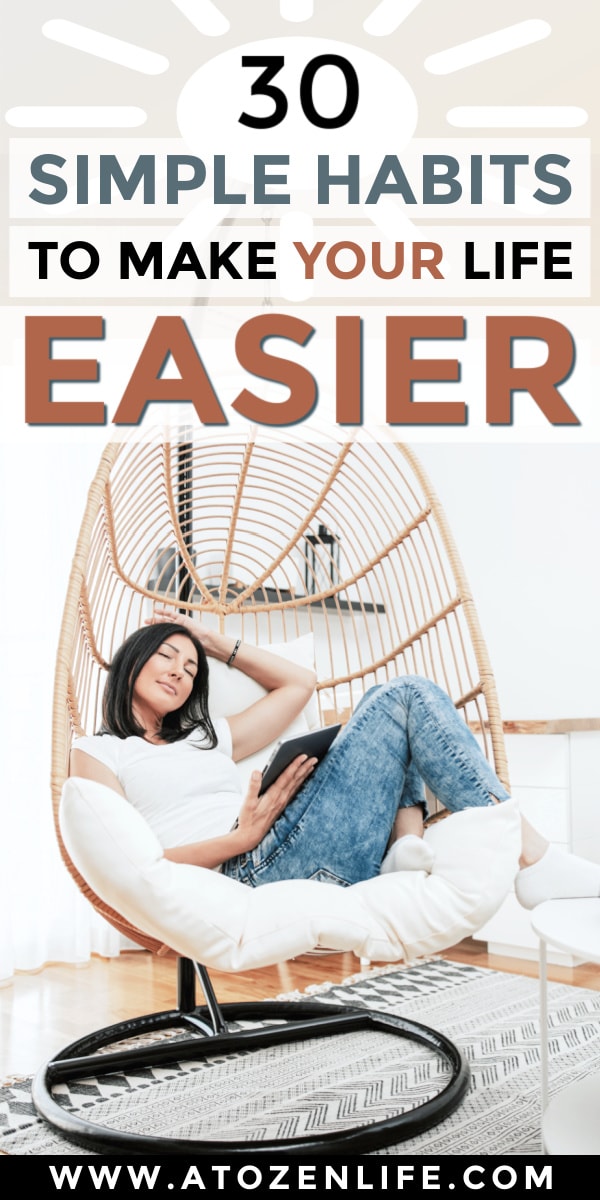 A woman in a chair reading tips to make life easy and relaxing